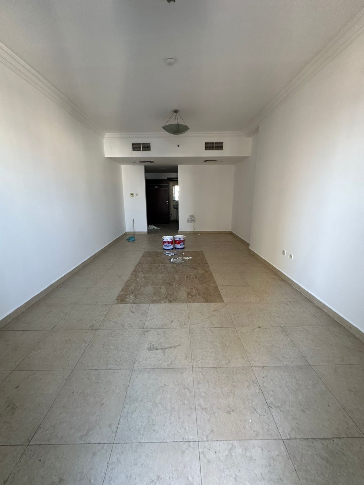 For annual rent in Sharjah, Al Taawun area, two bedrooms and a living room with free parking and a balcony. Prime location, close to all services.