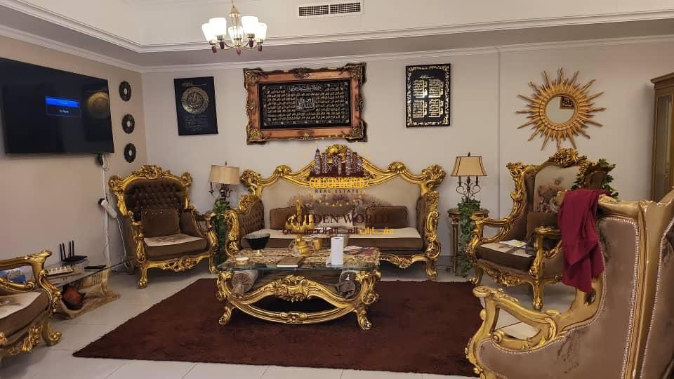 Three-bedroom apartment in Al Majaz 1 with direct lake view, three bathrooms, spacious bright kitchen, internet and parking included, free AC, AED 8,5