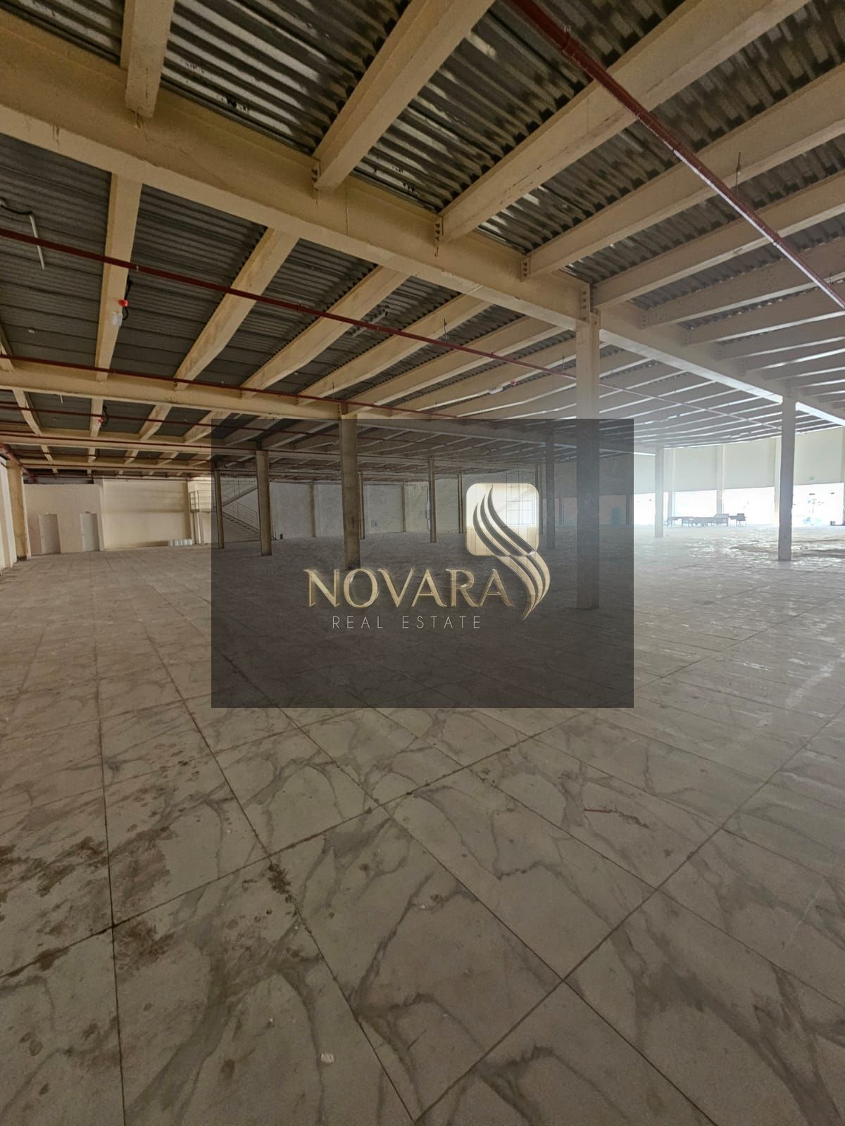 Spacious Showroom for Rent in Al Jurf Industrial 3 – Prime Location on Main Road
