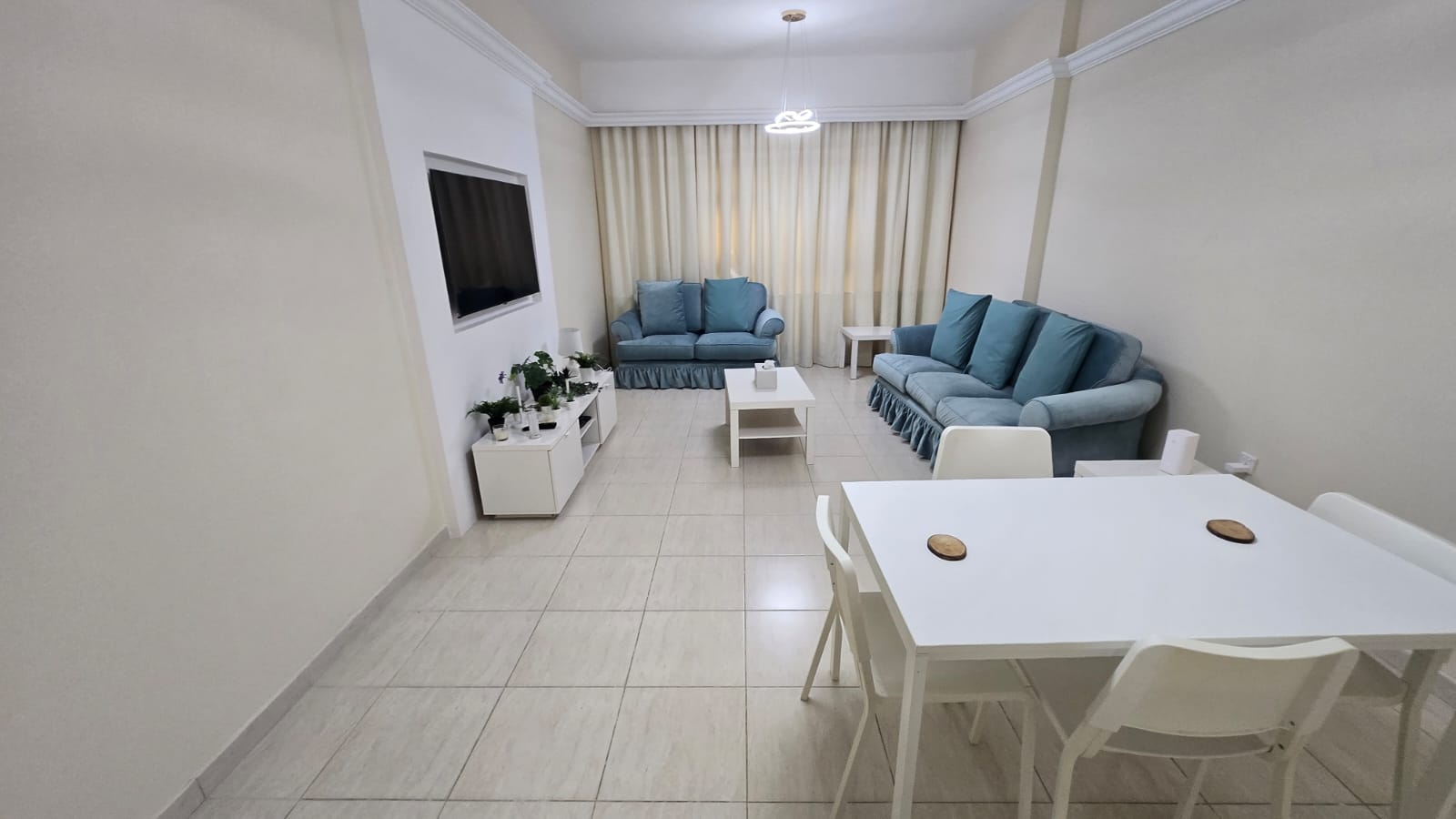 Furnished two-bedroom apartment with living room in Al Majaz 2, kitchen balcony, panoramic view, internet included, two bathrooms, parking, clean