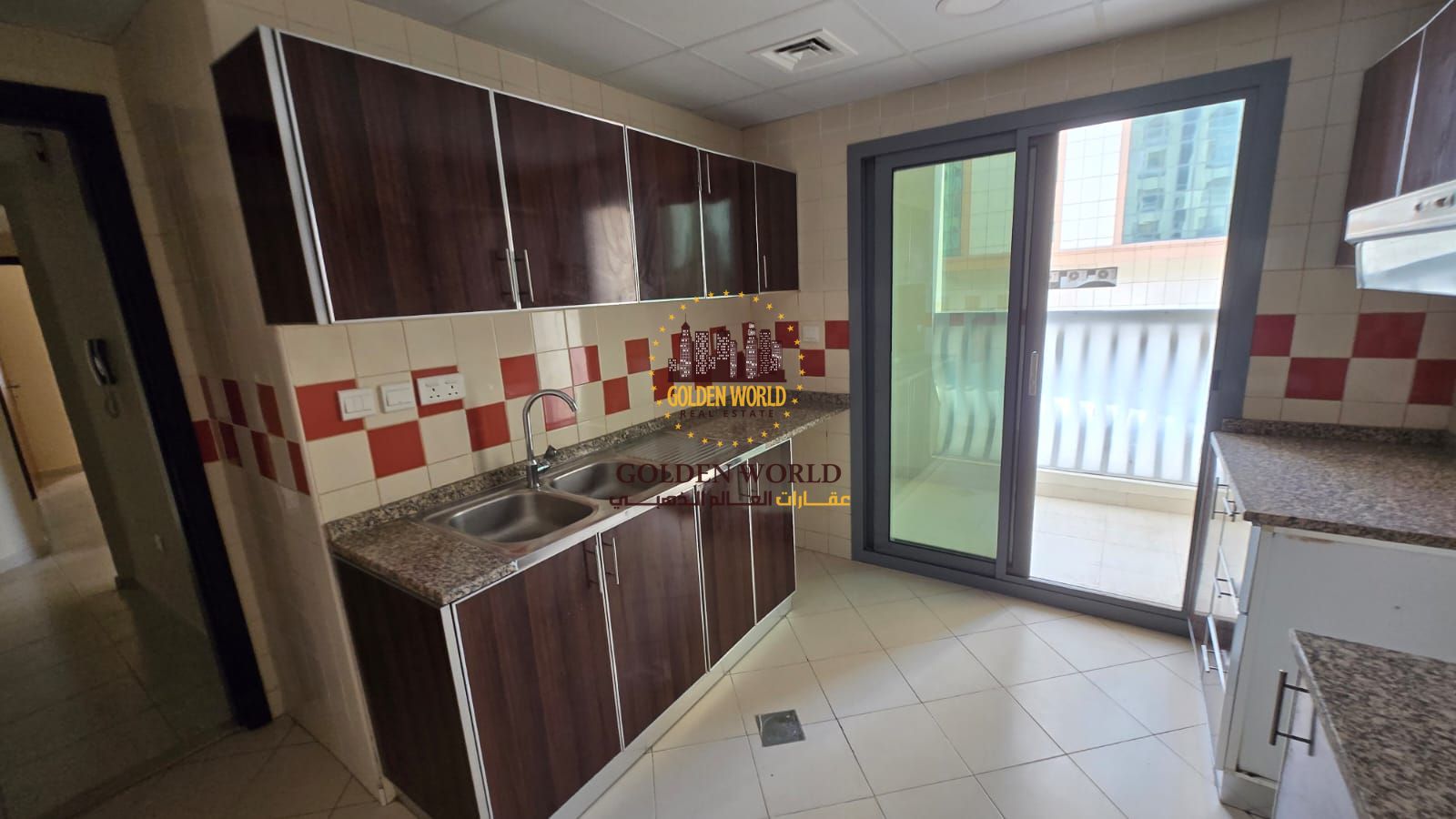2-bedroom apartment in Al Majaz 2, with a balcony in the kitchen, 2 bathrooms, nice finishes, and an open view.