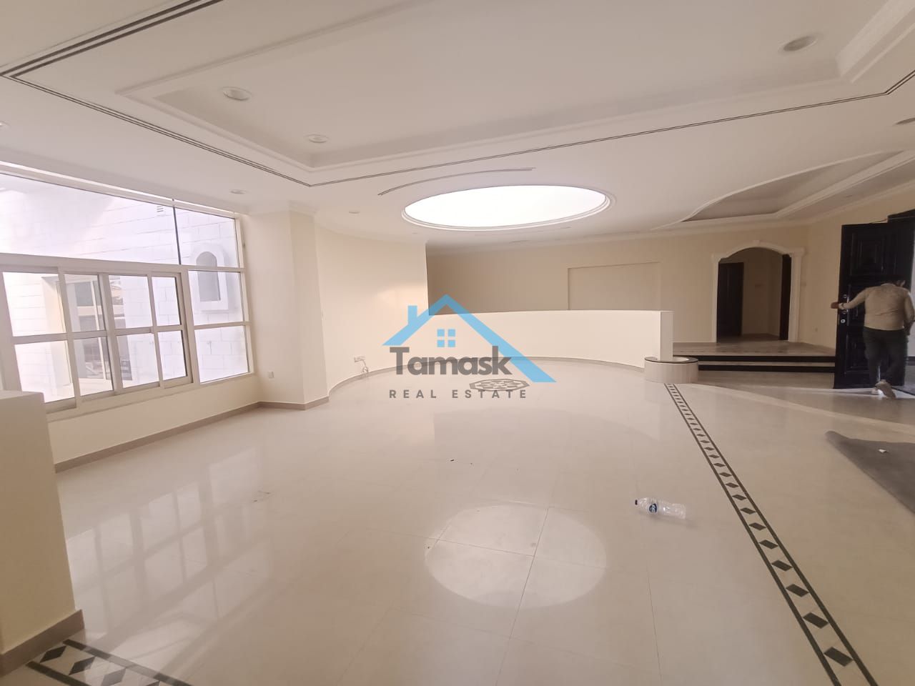 Super deluxe villa for rent in Al Warqa 4, consisting of 5 master bedrooms, a large living room, a large majlis, a dining room, a maid's room, a laund