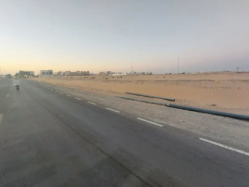 Two adjacent plots of land for sale in Al Sajaa Industrial Area