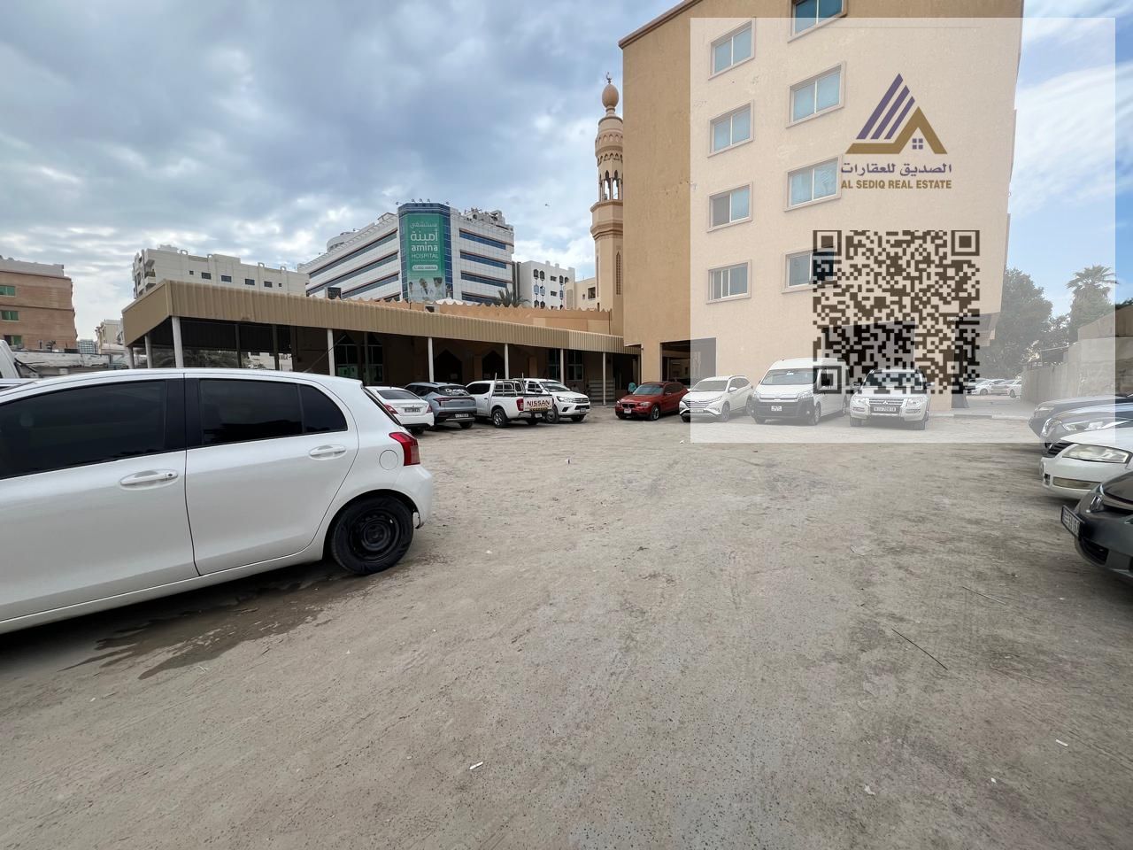 Residential investment land for sale, ground floor + 6 floors, next to the mosque, opposite Amina Hospital.