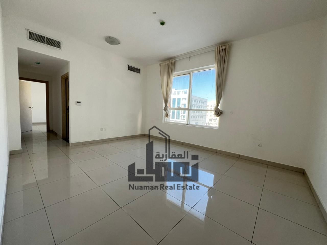 Spacious 1BR Apartment for Rent | 2 Bathrooms + Balcony | Open View | 12 Flexible Cheques Experience modern living in this bright and airy 1-bedroom
