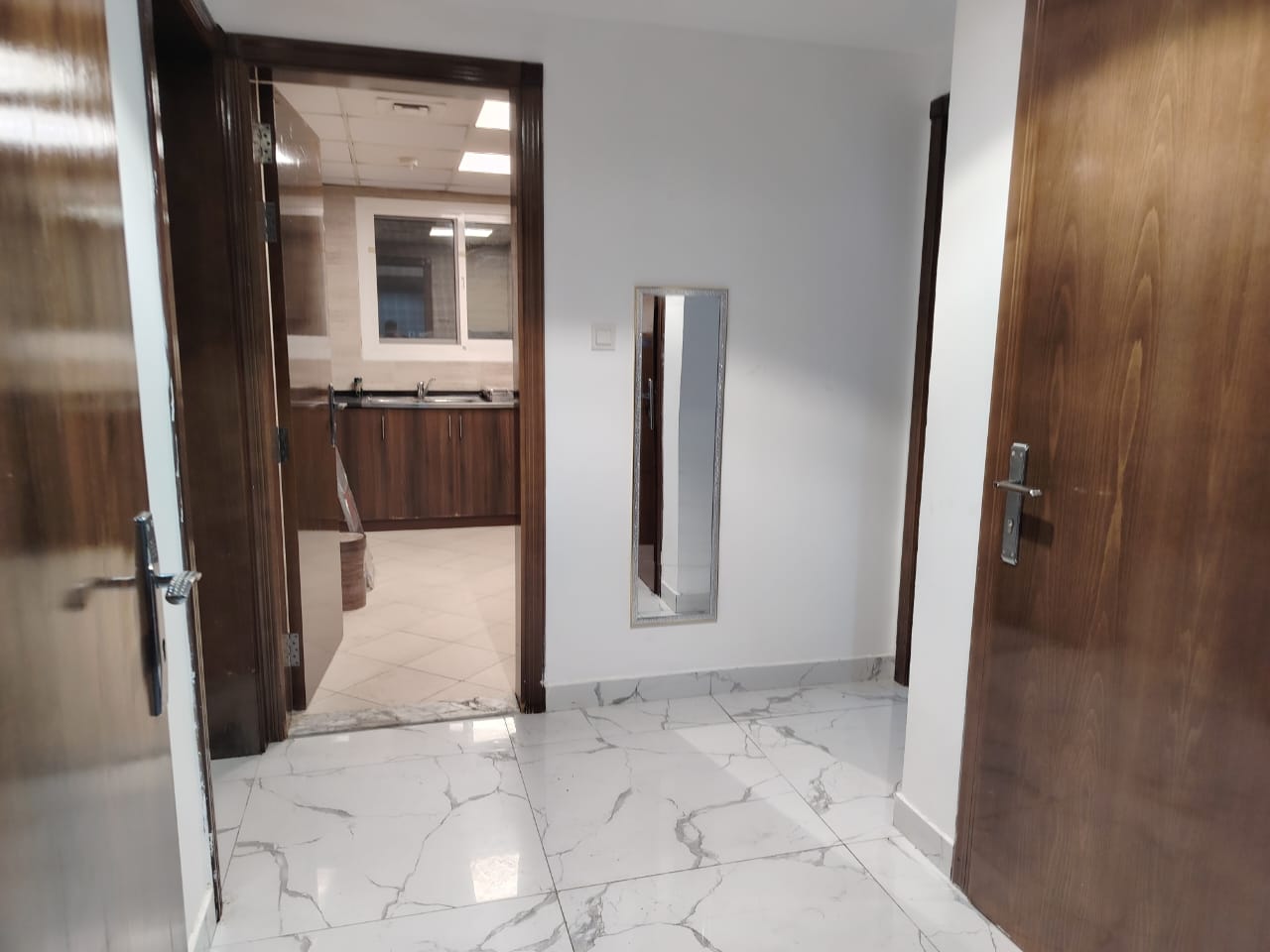 Furnished one-bedroom apartment for monthly rent in Al Rashidiya Ajman, Al Waha Towers, creek view, spacious, utilities included