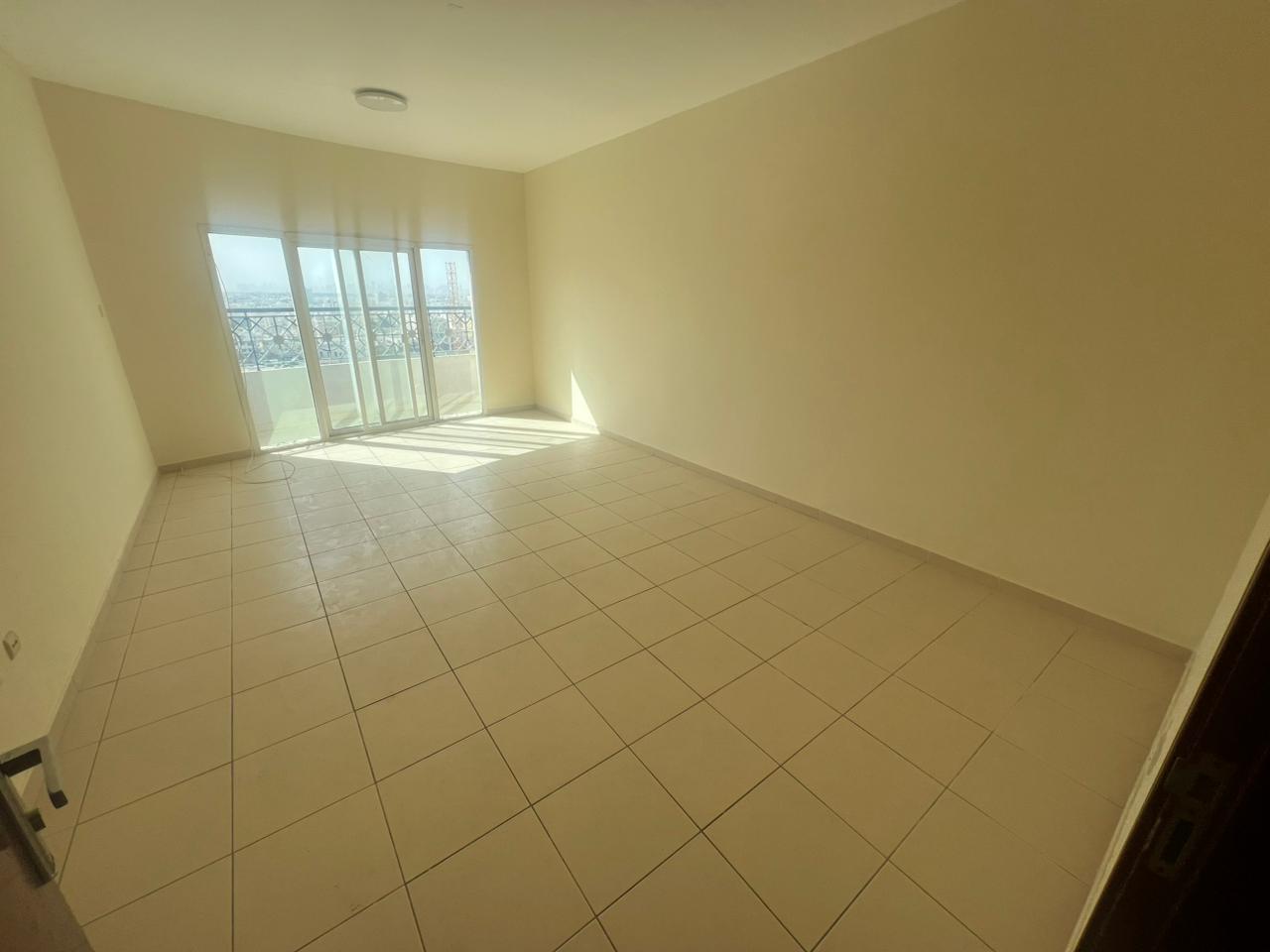 Two bedrooms and a living room for annual rent in Ajman Al-Nuaimiya 1, opposite Al-Hikma School Built-in wardrobes in each bedroom Separate living