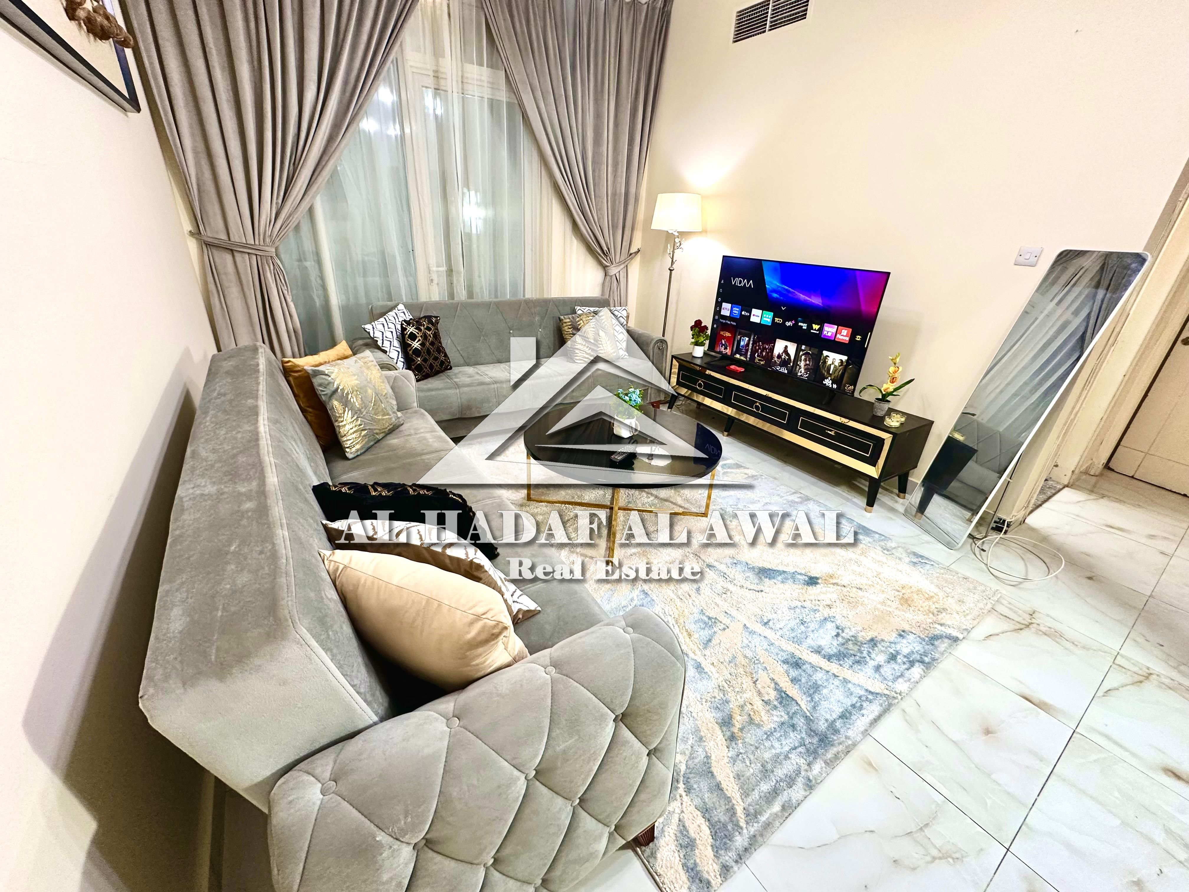 For monthly rent in Al-Qusba: one bedroom and a living room with 2 bathrooms and a balcony facing the main street. Rent is 5200, deposit 1000.