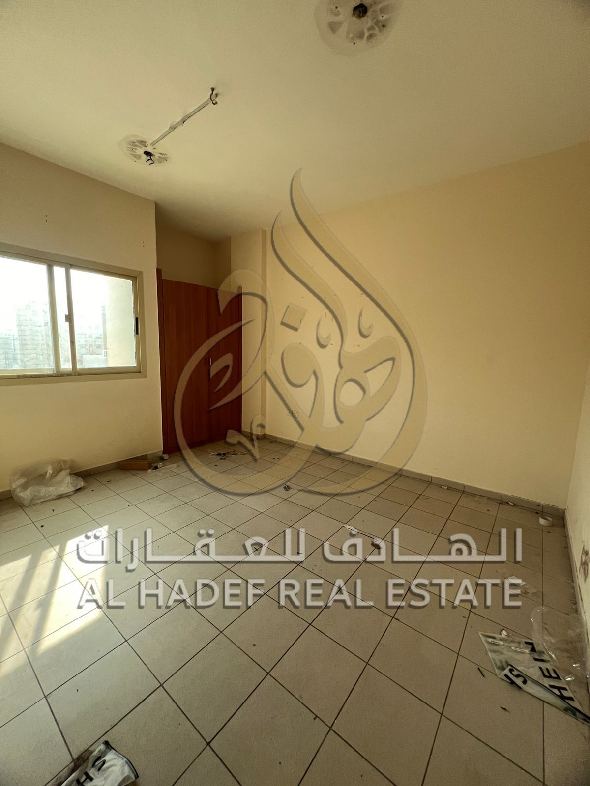 One-bedroom apartment with a living room for annual rent in Al Qasimia, payable in 4 or 6 installments. Security deposit in cash. Maintenance is the o