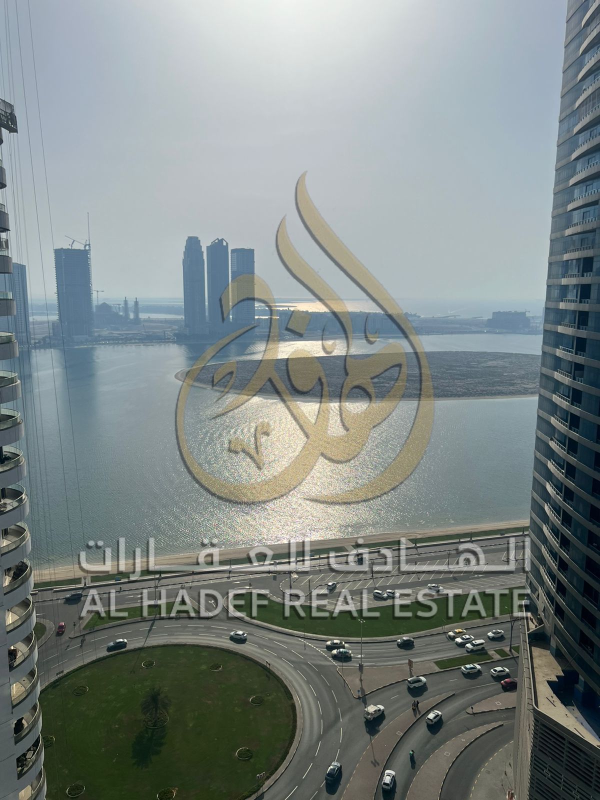 For rent in Al Taawun area, Sharjah A spacious 3-bedroom apartment with a living room, 3 bathrooms, and a balcony with a direct view of Al Khan Lake.