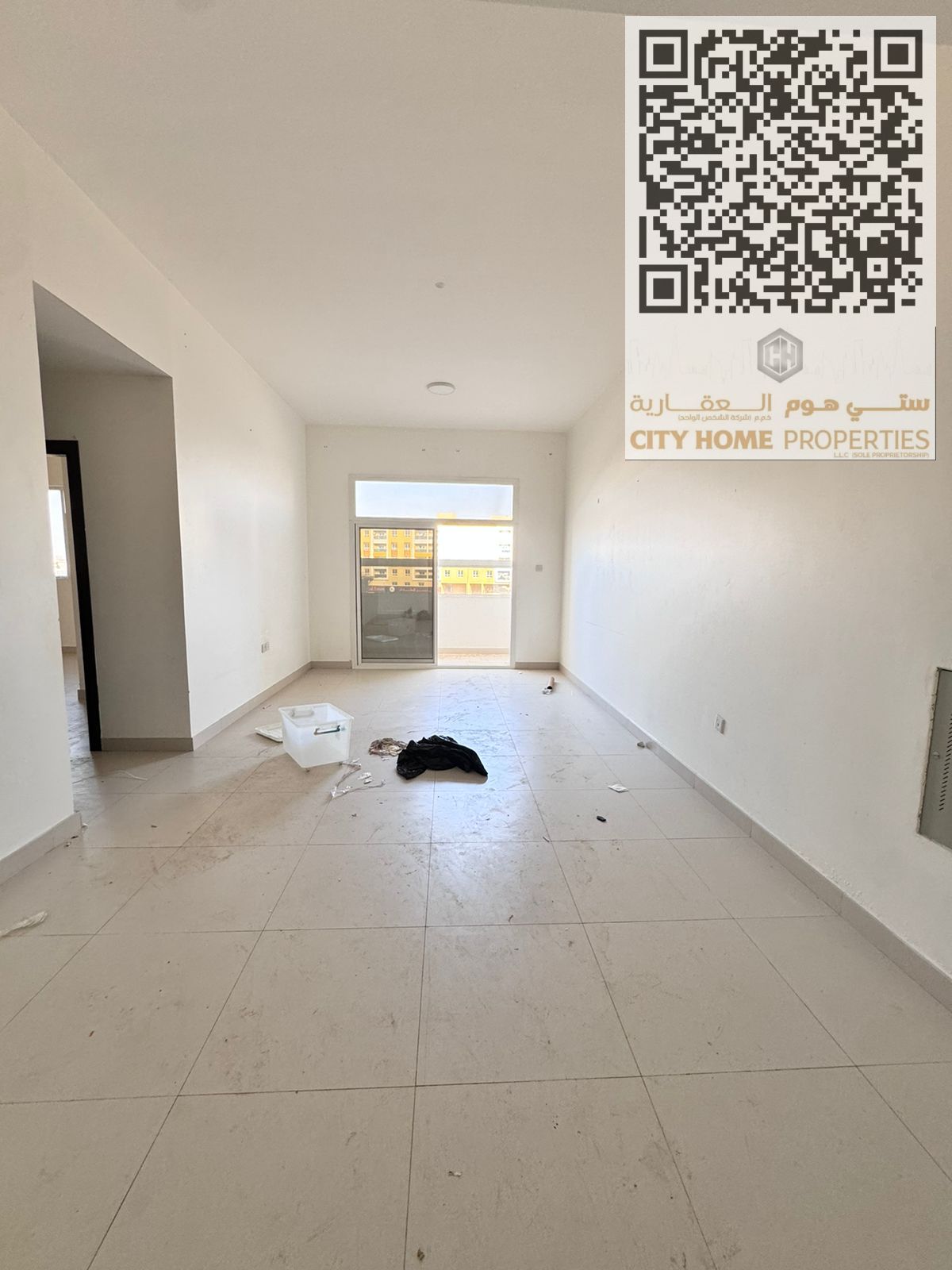 A spacious 2-bedroom apartment with a living room is available for rent in Al Mowaihat 3, in a family-friendly building. The apartment is located near