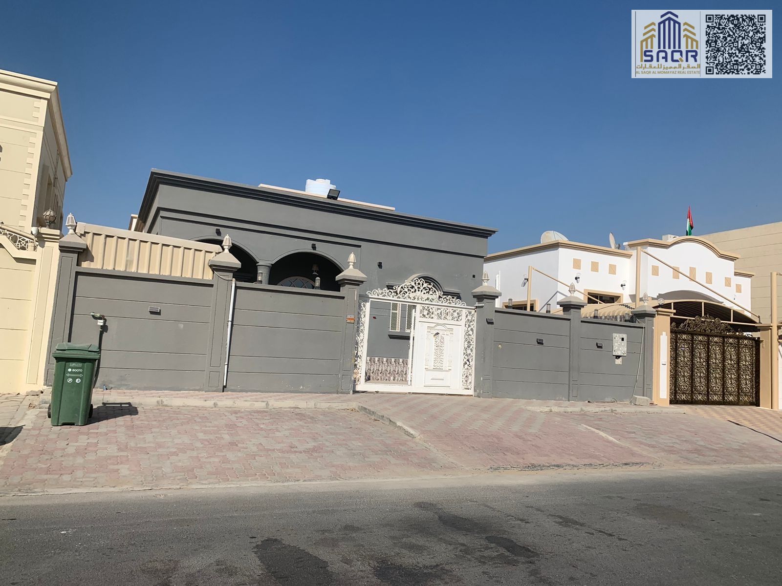 Villa for rent in Ajman, Al Raqaib area, featuring a prime location directly opposite a mosque in a quiet family-friendly neighborhood. The villa sits on a 5,000 sq. ft. plot and consists of a ground floor with 3 spacious bedrooms, a majlis, a comfortable