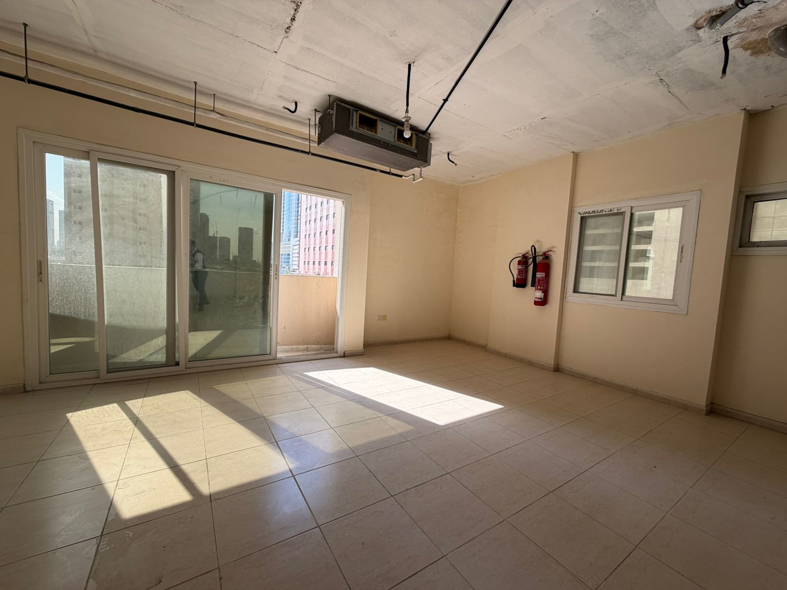 Spacious Office for Rent in Al Khan on Main Road, Large Area, Balcony, 2 Bathrooms, High Visibility Location, Easy Access to Dubai, Ideal for Business