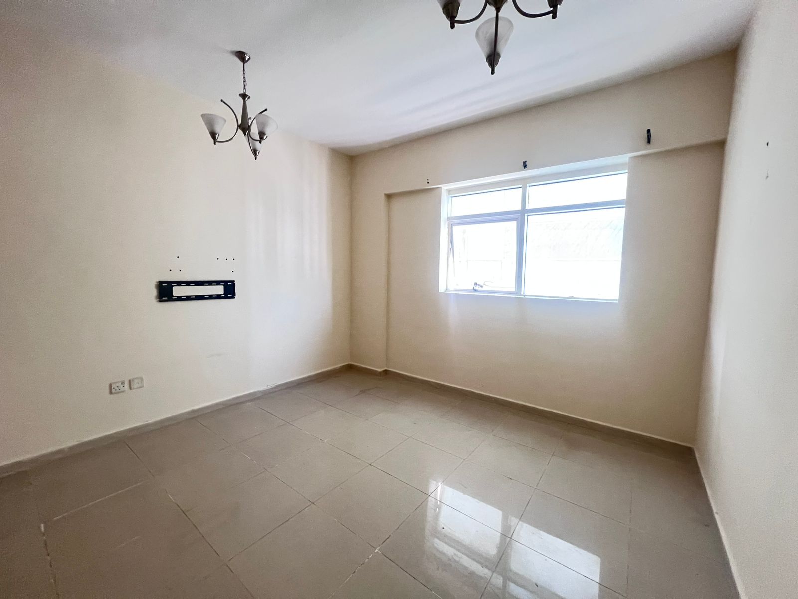 Spacious one-bedroom apartment with open view, central AC and gas, very flexible payment plan, close to the Amiri Diwan and all services.