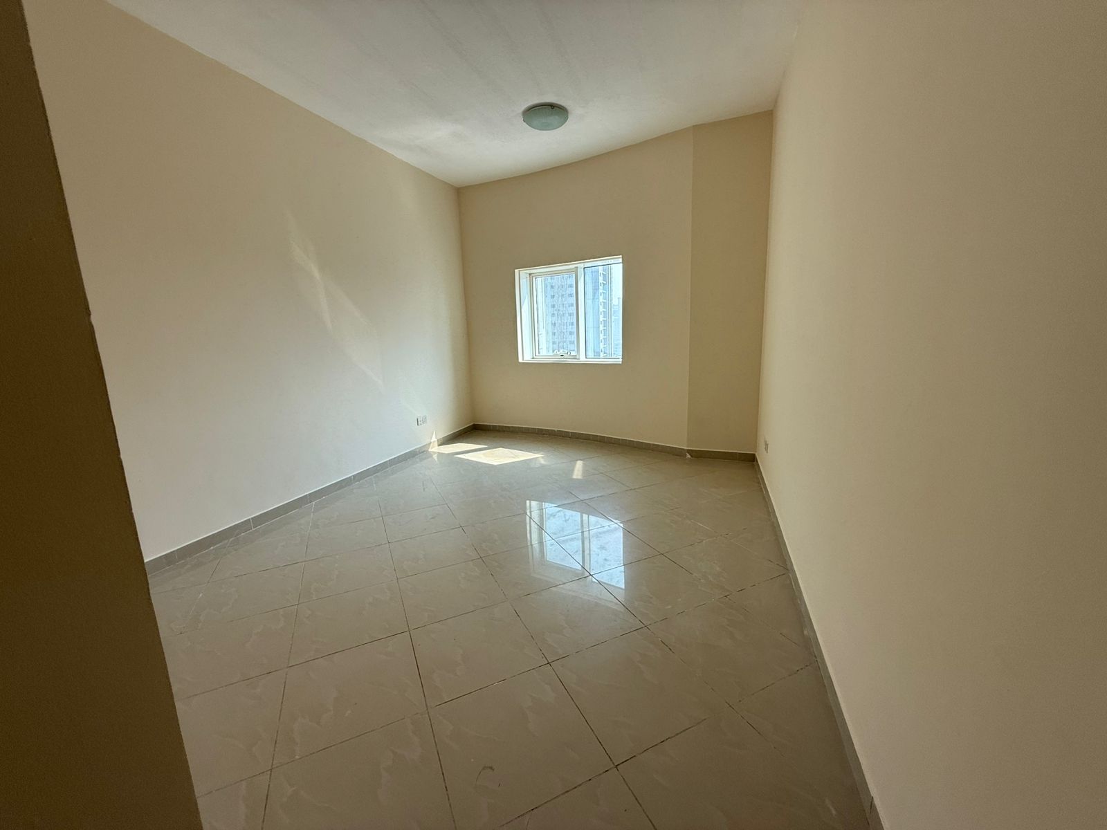 Air conditioning, gym, swimming pool, two bathrooms, one bedroom and living room, spacious areas in Al Majaz 1, open view, in a vibrant location close