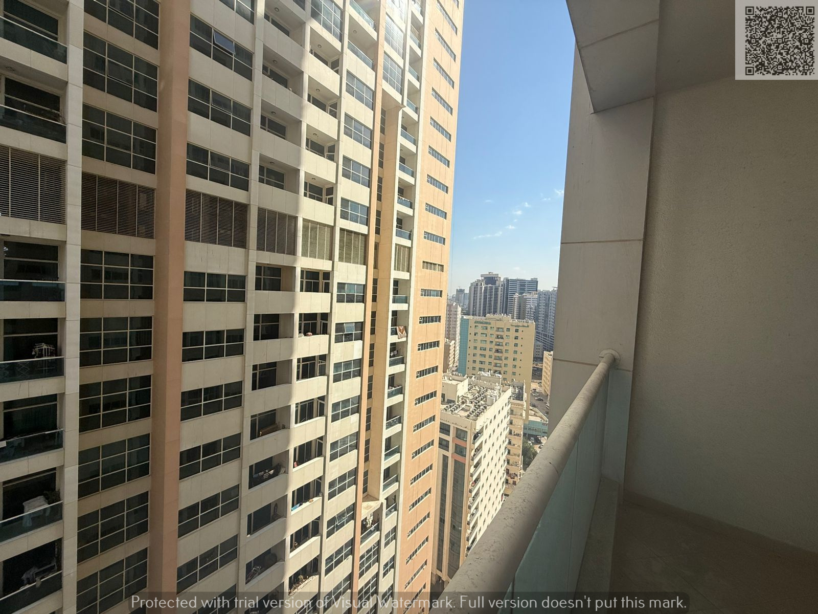 2-bedroom apartment for rent in Ajman One Towers, annual contract, four payments, security deposit by cheque.