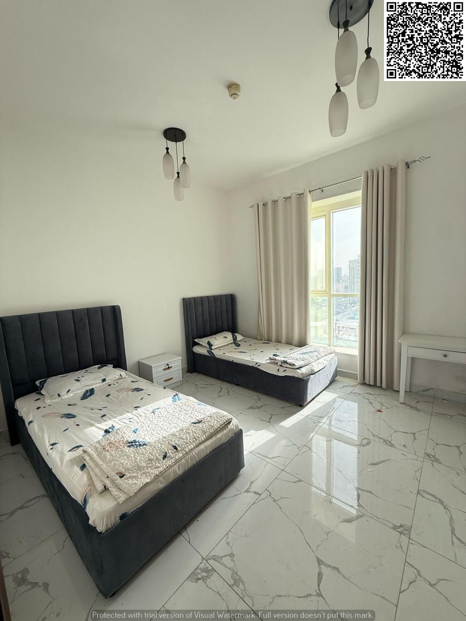 Two-bedroom apartment for sale in Al Waha Towers, one of Ajman’s most prestigious residential towers