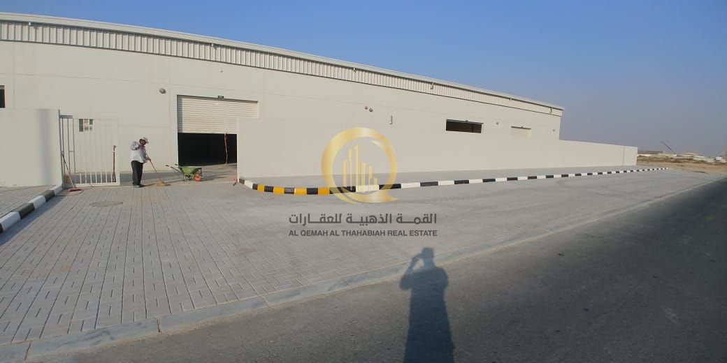 Warehouses for sale in Al-Sajaa Industrial Area Block 2, corner on two streets, 36 meters each. City of Emirates Industrial. Land area: 32,880 sq.