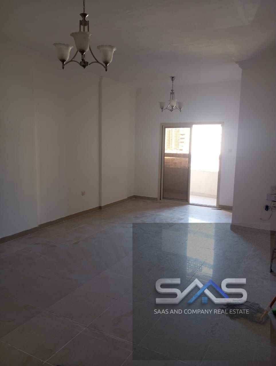 Three-bedroom apartment with a living room for annual rent in a prime location close to all services and amenities.