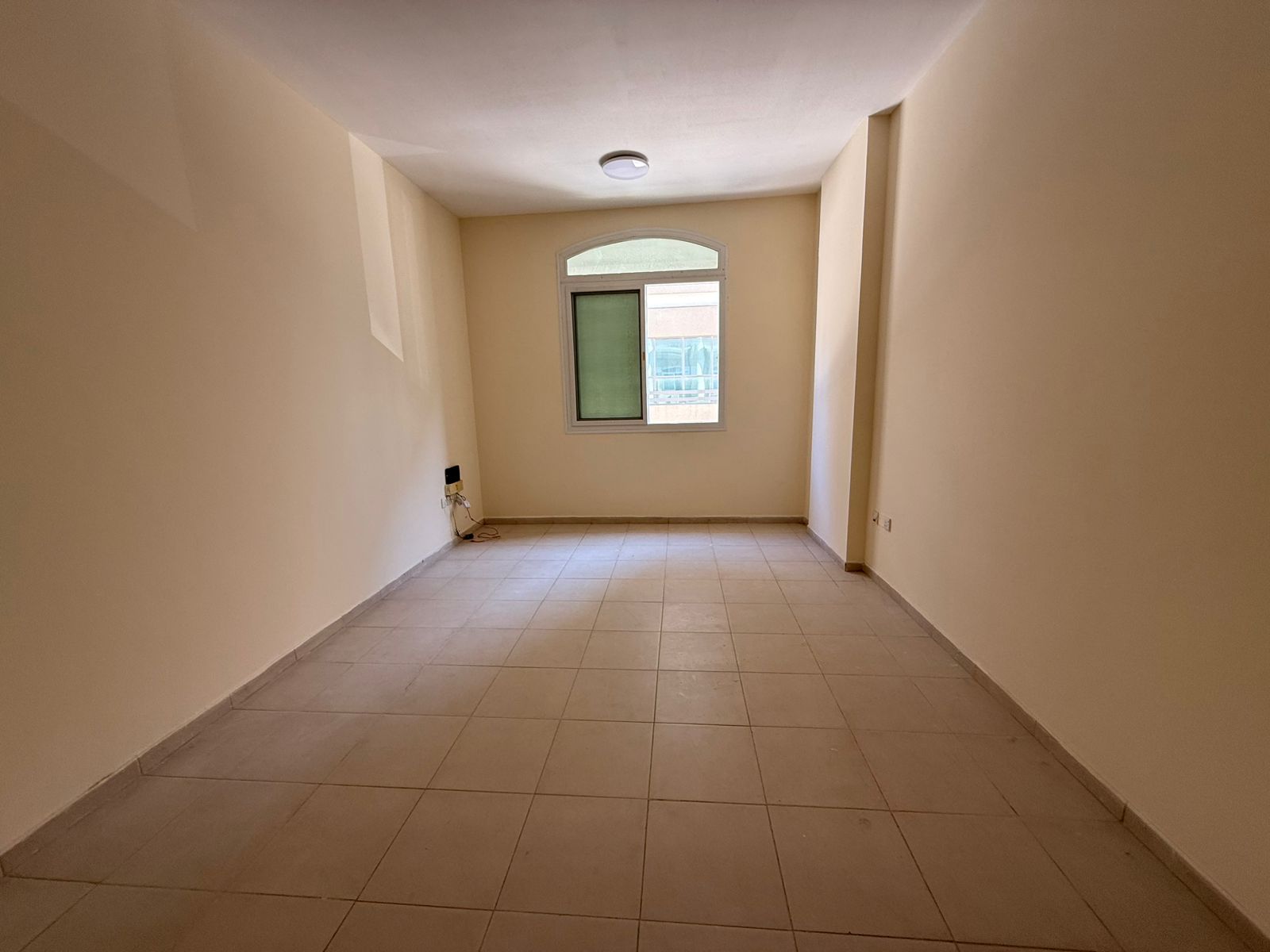 2BedRoom + living room for annual rent in Al Qulayaa. Quiet building, spacious, central AC, free pool & gym.