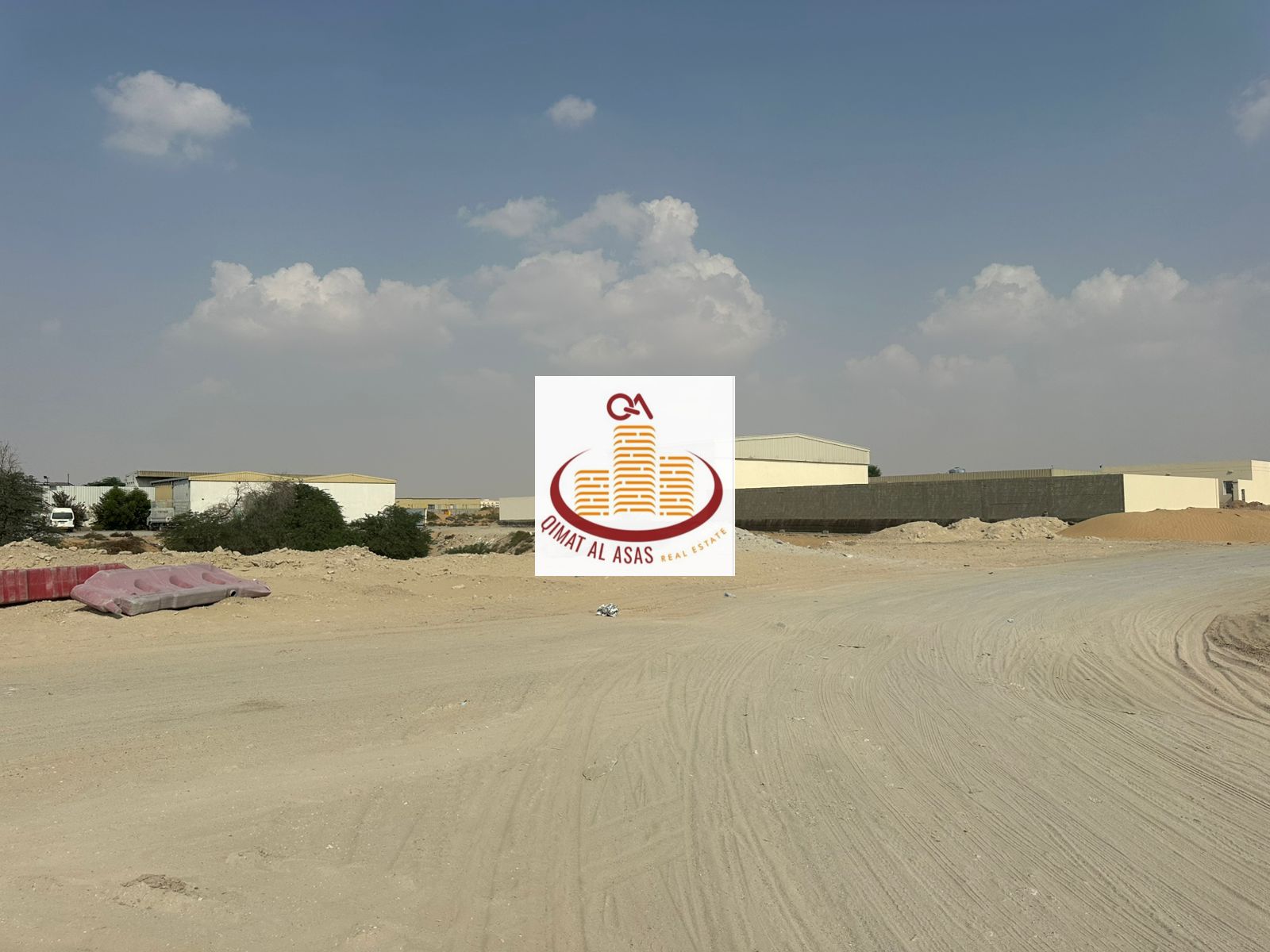 For sale, a built-up land in the Al Sajaa Industrial Area-Al SajaaS with an area of 10,000 square feeT