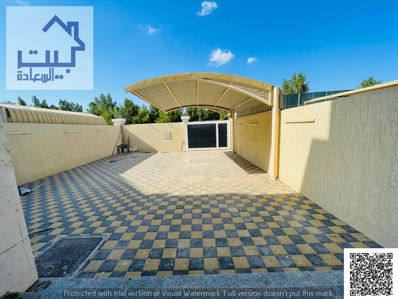 Villa for rent in Al Yasmin area, consisting of 5 master bedrooms, a living room, a large shaded courtyard.