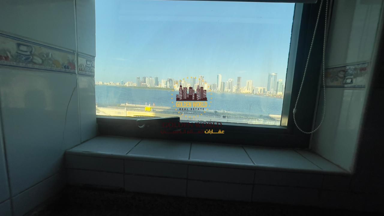 Apartment for rent in Al Majaz 3 – Al Qasba, 3 bedrooms and living room with full panoramic sea view, very clean, ready to move in, with parking. Ren