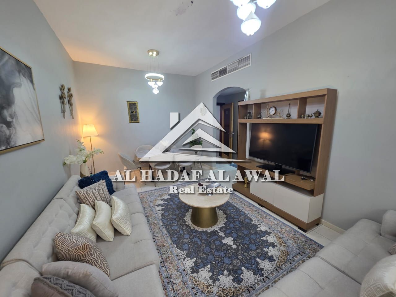 Sharjah, Al Khan area: Two bedrooms and a living room, furnished with a balcony. Rent is 6500 AED including internet. Security deposit of 1000 AED. Re
