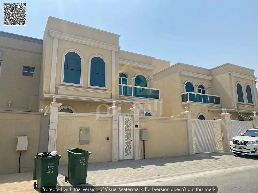 Luxury villa for sale in Al Helio 2, Ajman, including electricity, water, and air conditioning. Modern design and prime location. Freehold ownership f