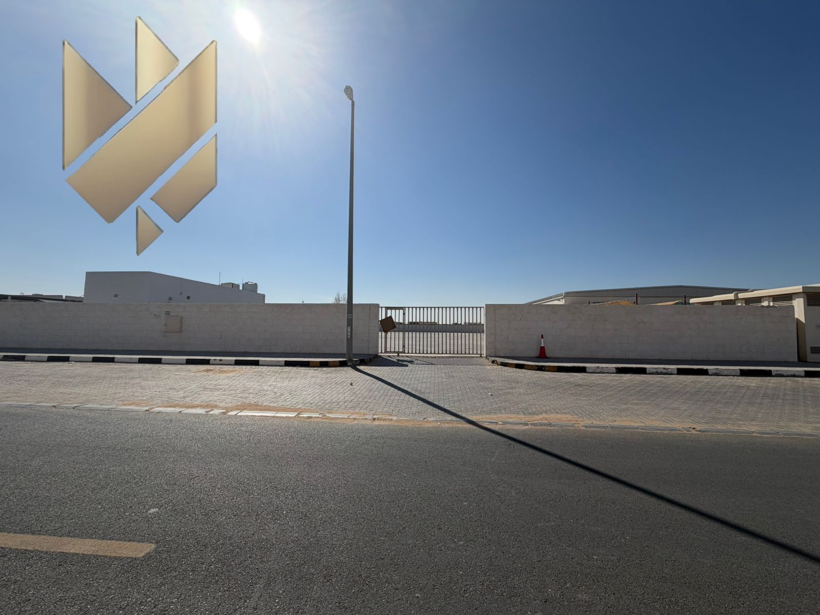 For Rent – Plot in Al Sajaa | Prime Strategic Location | On a Main Street | Spacious Area | External Parking | Suitable for Any Commercial or Industri