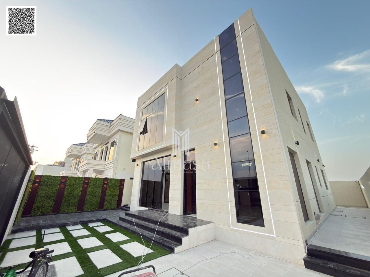 Elegant 4BR villa with stone façade, hall, majlis, yard — all fees included.