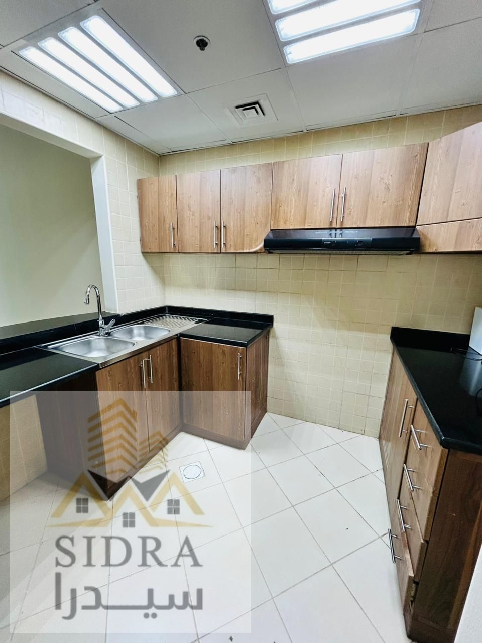 Two-bedroom apartment with a living room in Al Rashidiya 3, Ajman, close to the Ladies Park and all services.