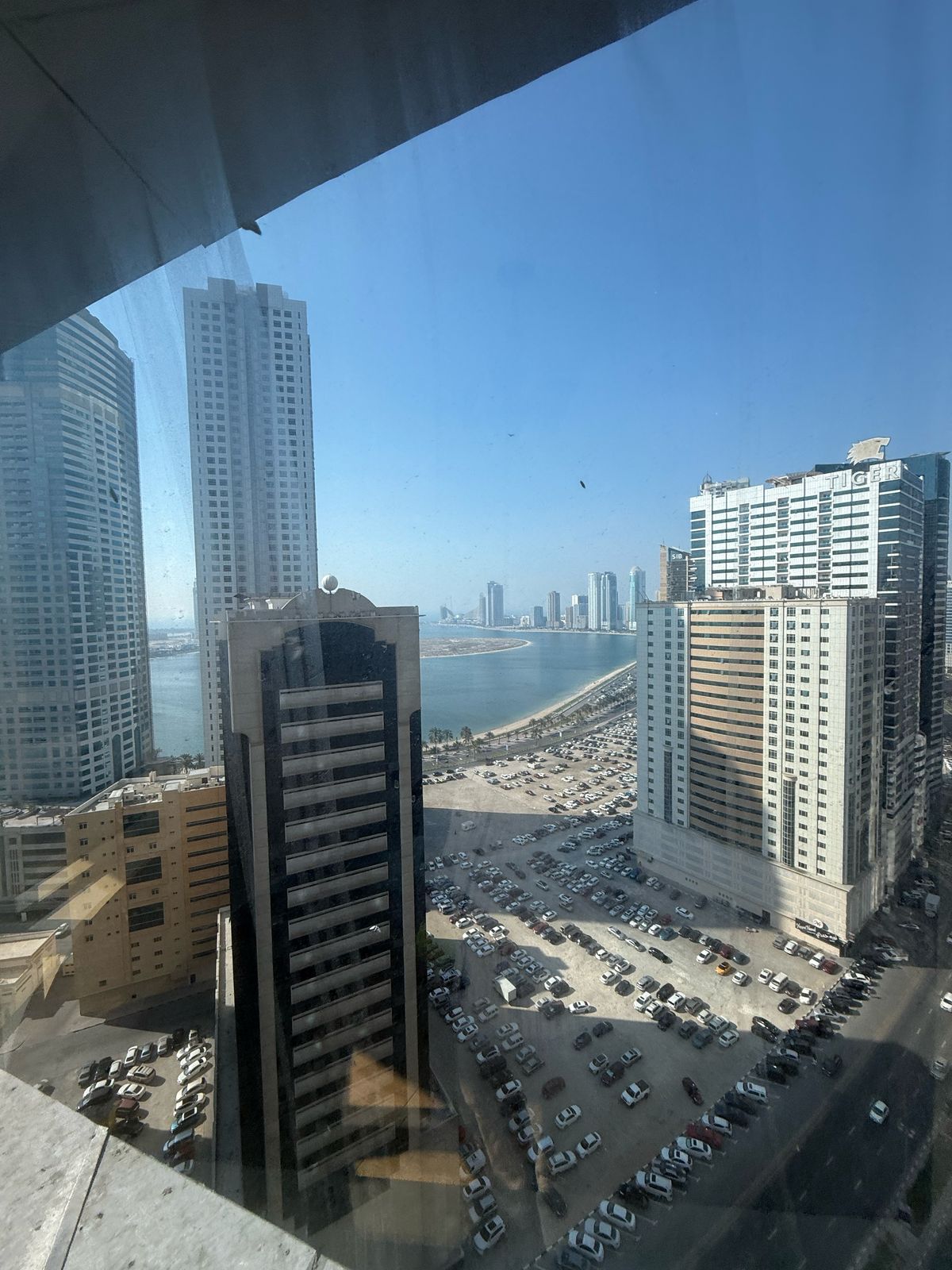 For rent in Sharjah – Al Taawun, a spacious 3-bedroom apartment with hall, featuring landlord-covered AC, free gym and swimming pool, free parking, an