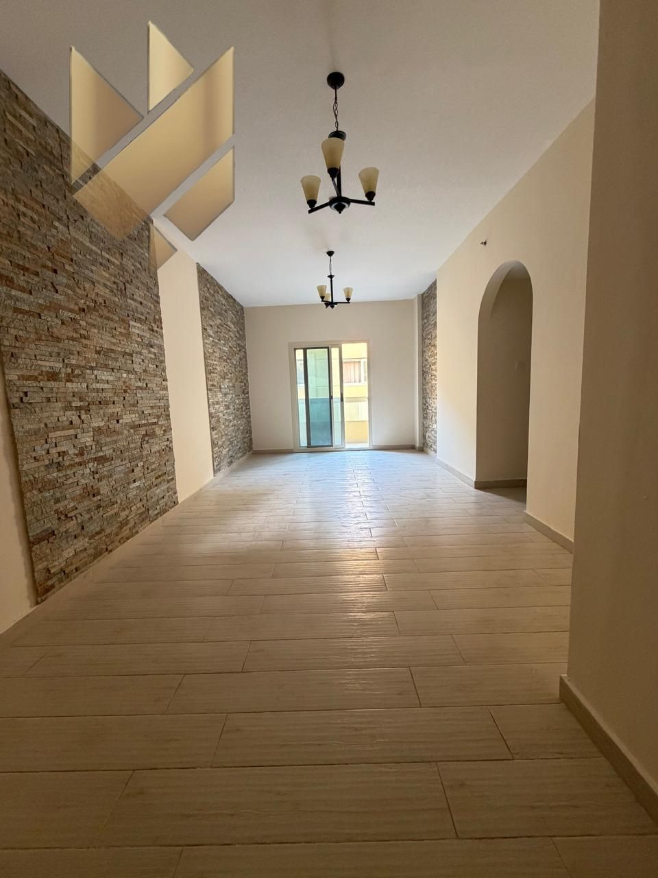 Two Bedrooms and Living Room for Annual Rent in New Muwaileh Prime location with payment facilities up to 12 installments Free parking inside the buil