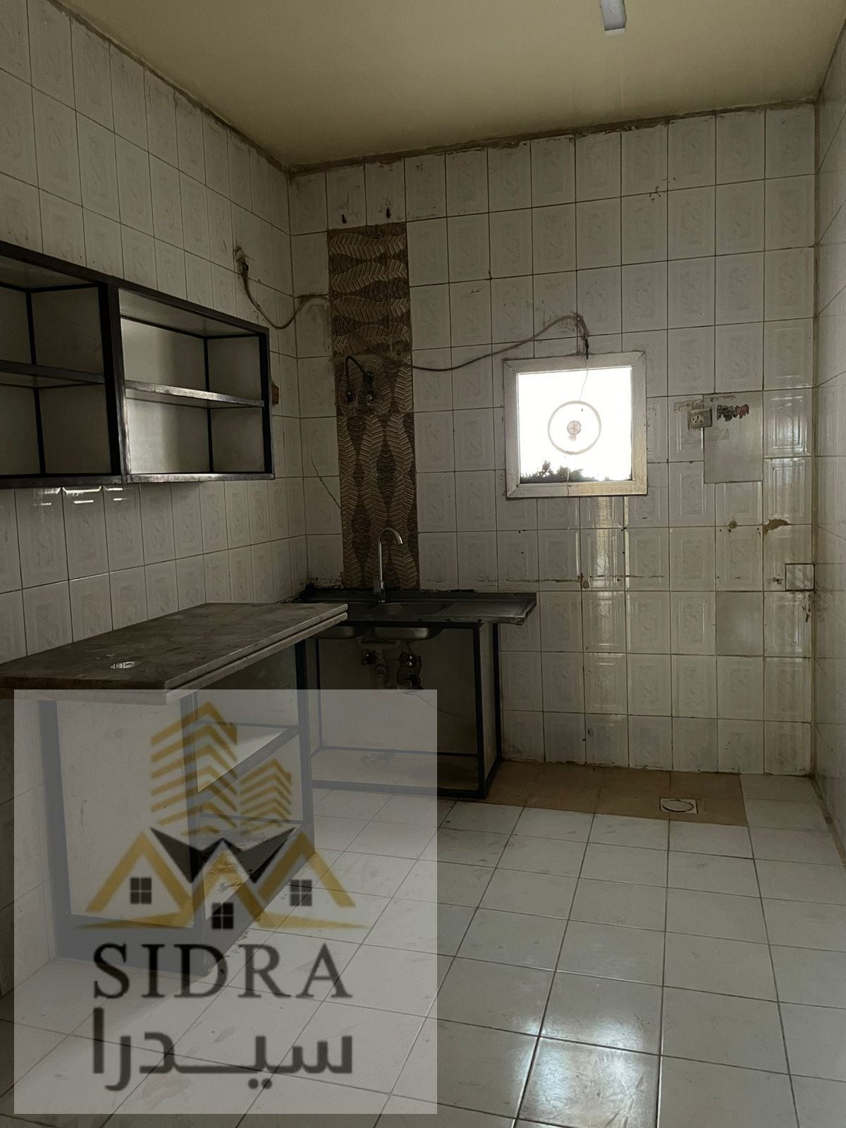The building is located in Al Rumaila 1, Ajman, near Giant Supermarket and Al Rumaila Towers.