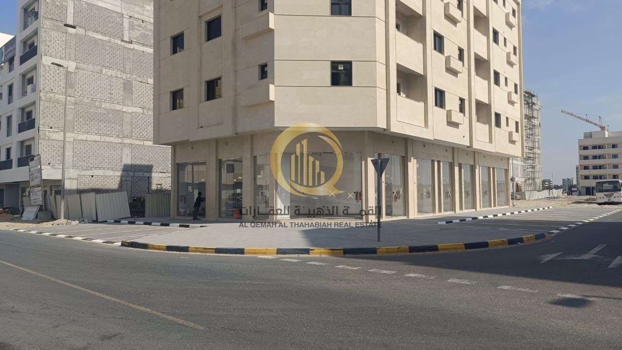 Building for sale in Muwailih Al-Falah, ground floor and four floors, with excellent income.