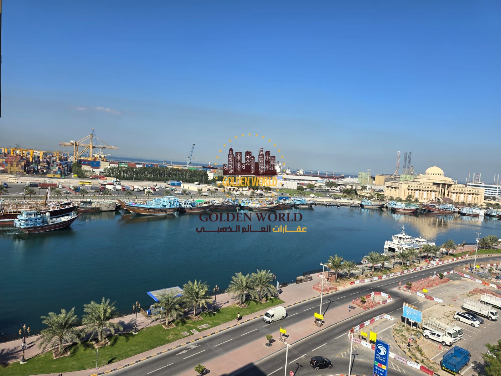 1BR apartment with balcony on Al Qasimia Al Jubail Corniche, open sea view, prime first-row location, annual rent AED 28,000.