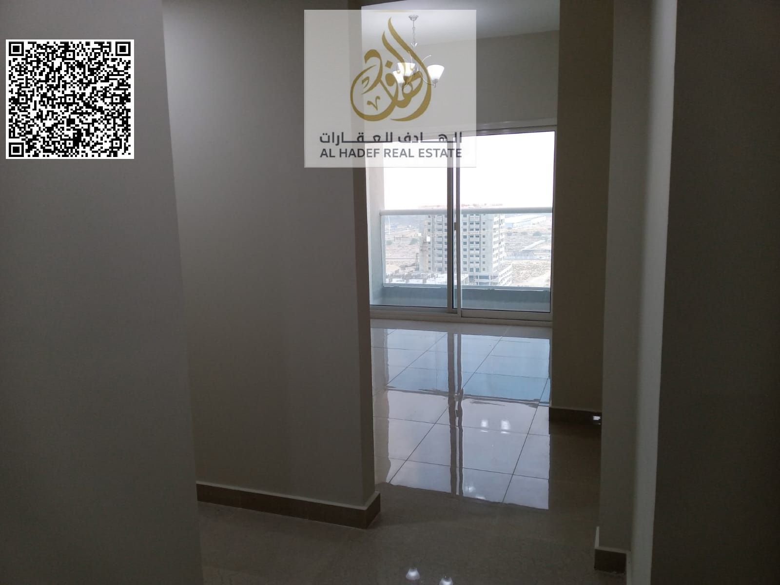 Two bedrooms, a living room with a balcony, two bathrooms, and parking directly on Mohammed Bin Zayed Road.