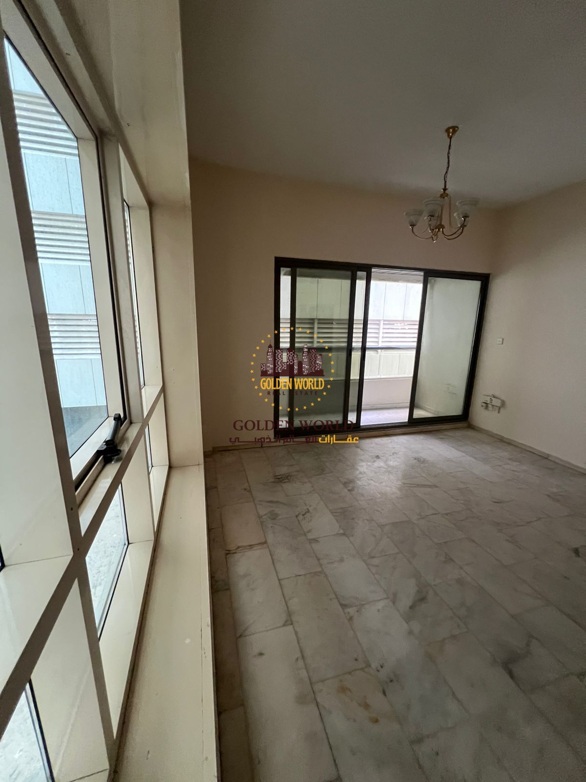 2BR apartment with balcony in Al Taawun, built-in wardrobes, master bedroom, 2 bathrooms, closed view for privacy, convenient location, 4 cheques.
