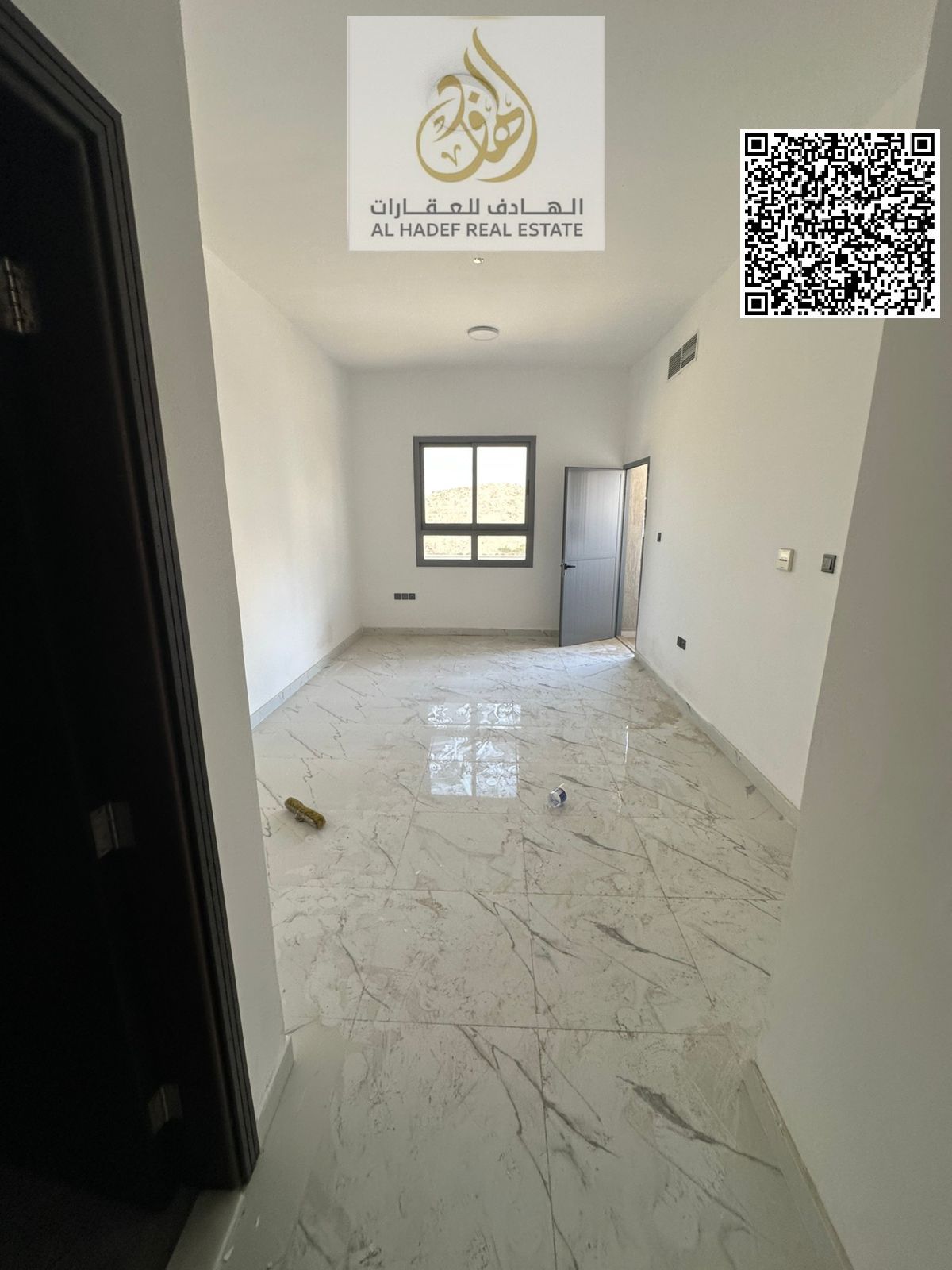 One bedroom, living room, balcony, two bathrooms, kitchen, and built-in wardrobes. First occupancy.
