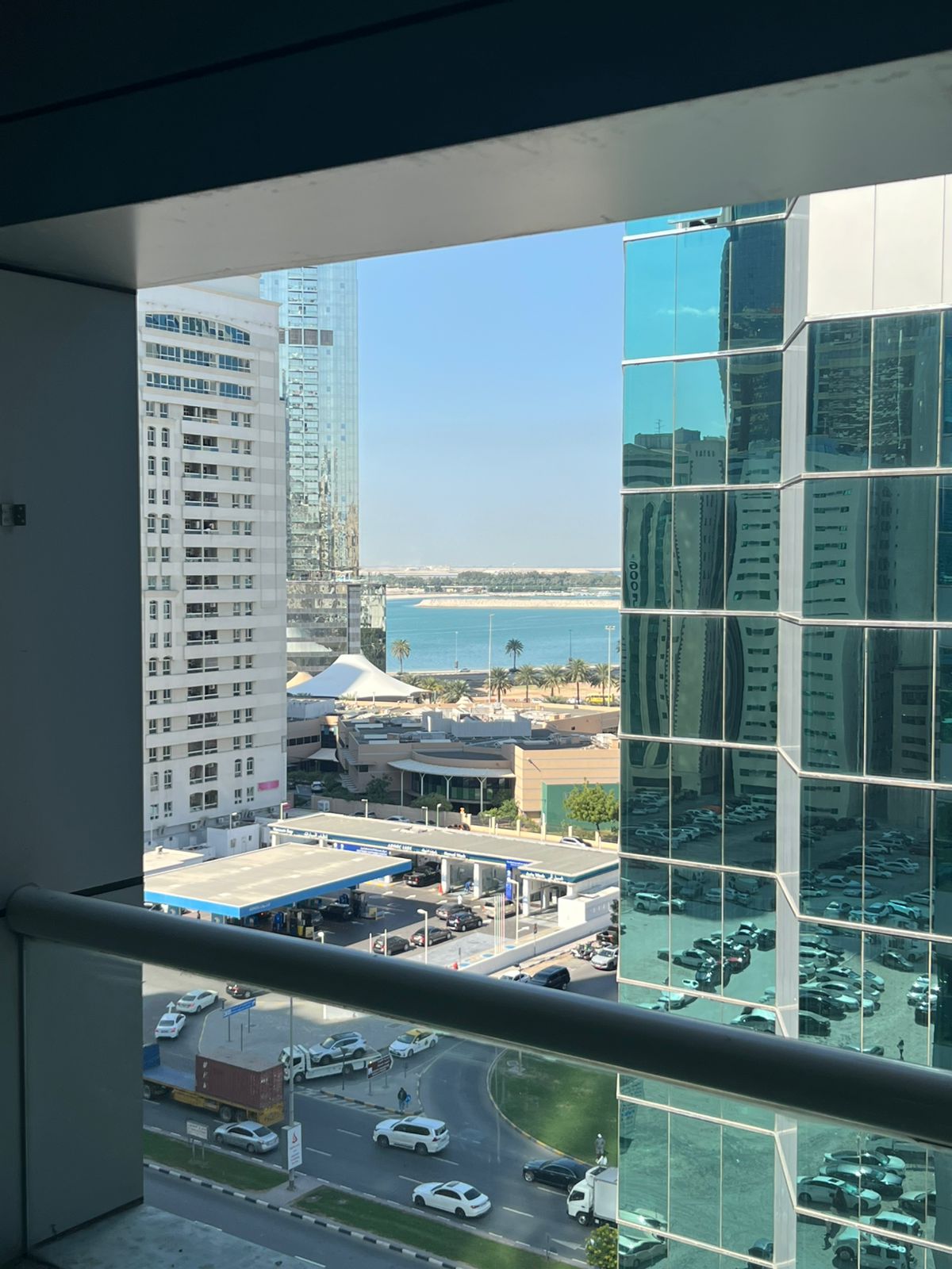 Three-bedroom apartment with balcony in Al Taawun. Two master rooms, maid room, sea view, rent AED 75,000.