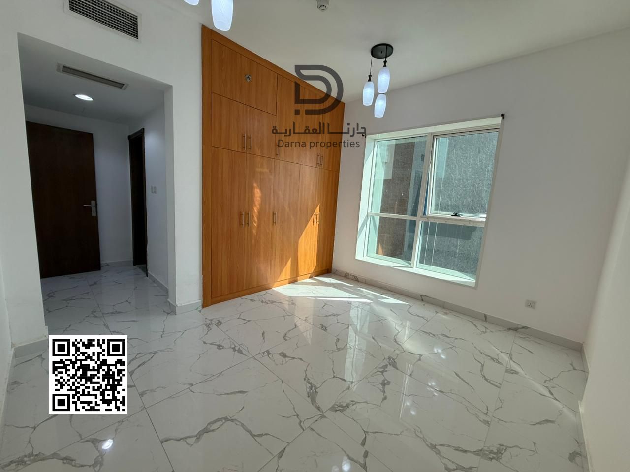Own a Two-Bedroom Apartment with Living Room in Al Waha Towers, Featuring a Highly Strategic Location Close to All Essential Services and Amenities