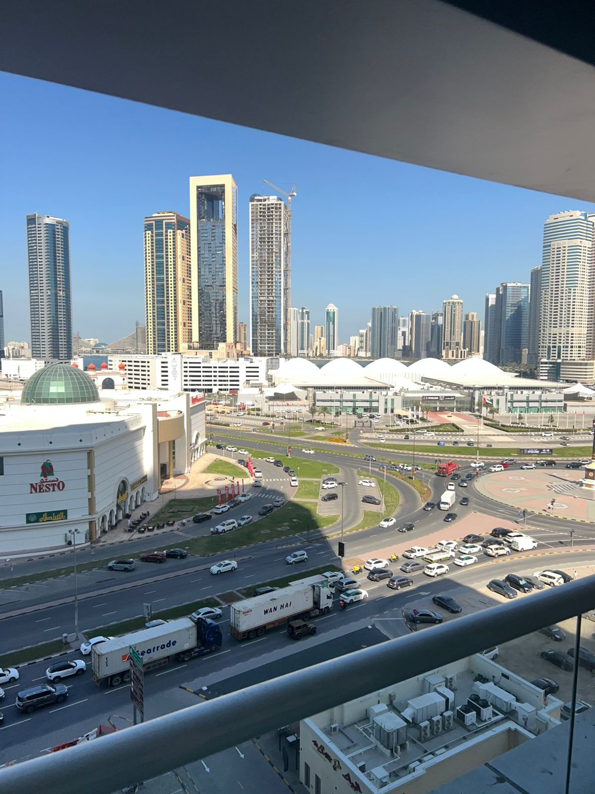 Three-bedroom apartment with balcony in Al Taawun. Central AC, full panorama, gym and pool. Rent AED 68,000.