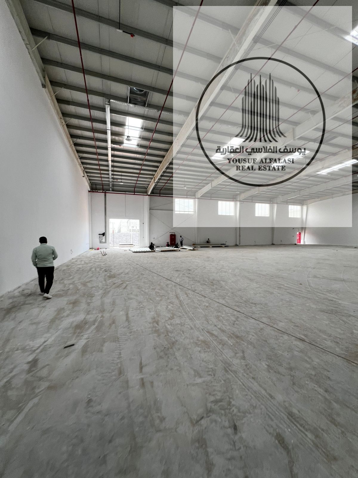 Integrated Industrial and Commercial Complex for Rent – Large Warehouse with Showrooms, Offices, and High-Capacity Electricity in Umm Al Quwain
