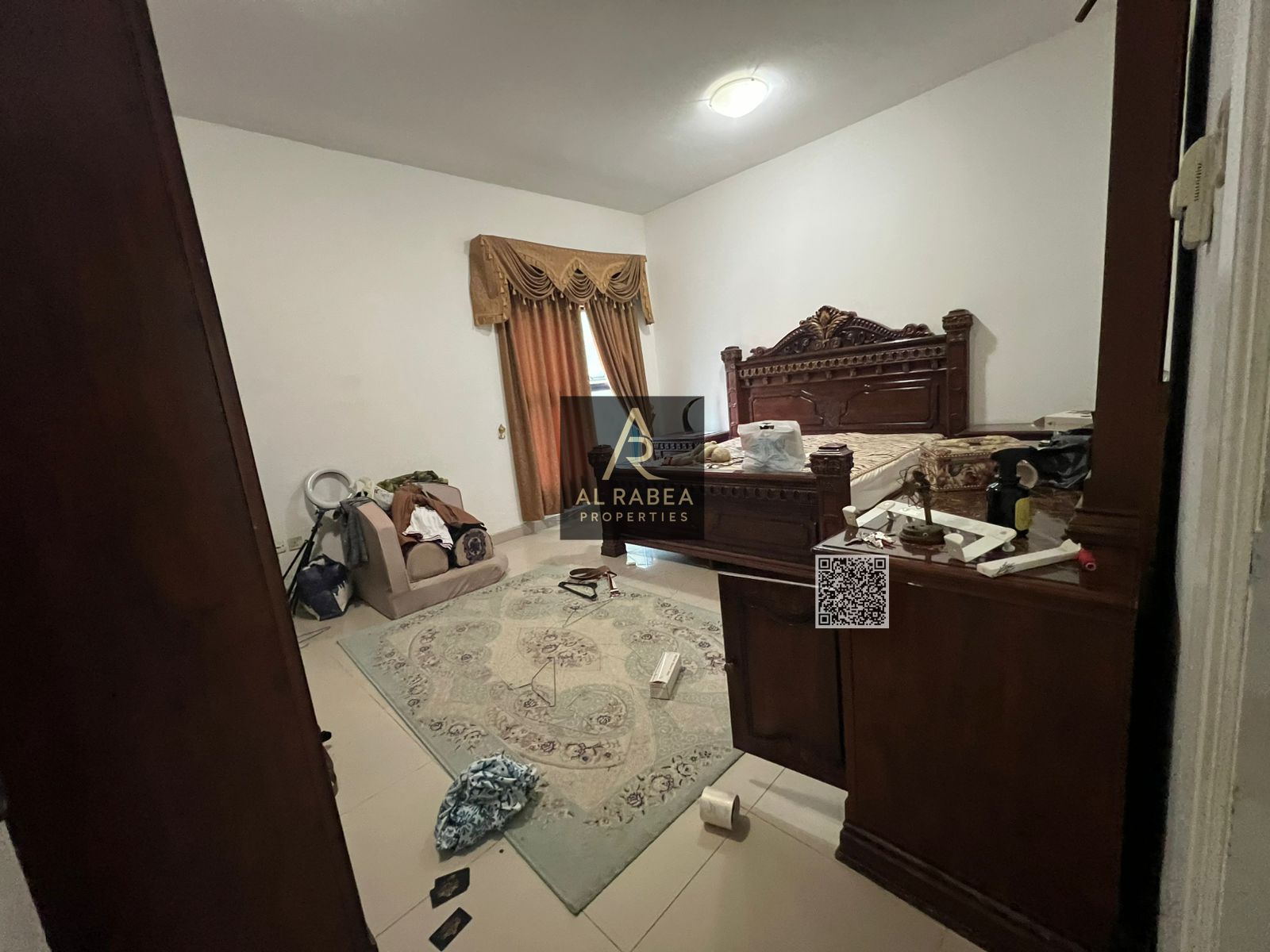 Two bedrooms, a living room, a maid's room, three bathrooms, and two balconies in Al Rashidiya 1, Al Khawar Towers