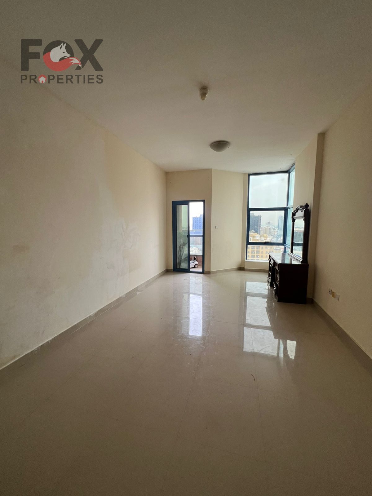 Two bedrooms and a living room for rent in Al Nuaimiya Towers, Tower C, with private parking. Prime location close to all services. Good finishing and