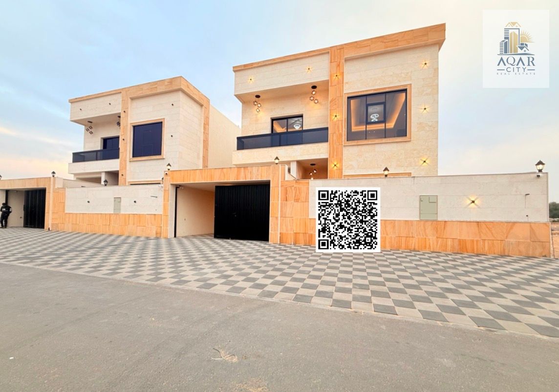 Villa for sale, freehold, open to all nationalities, registration fees included. Five master bedrooms, living room, majlis, dining room, kitchen, maid's room, and preparation kitchen. Built-up area: 3400 sq ft.