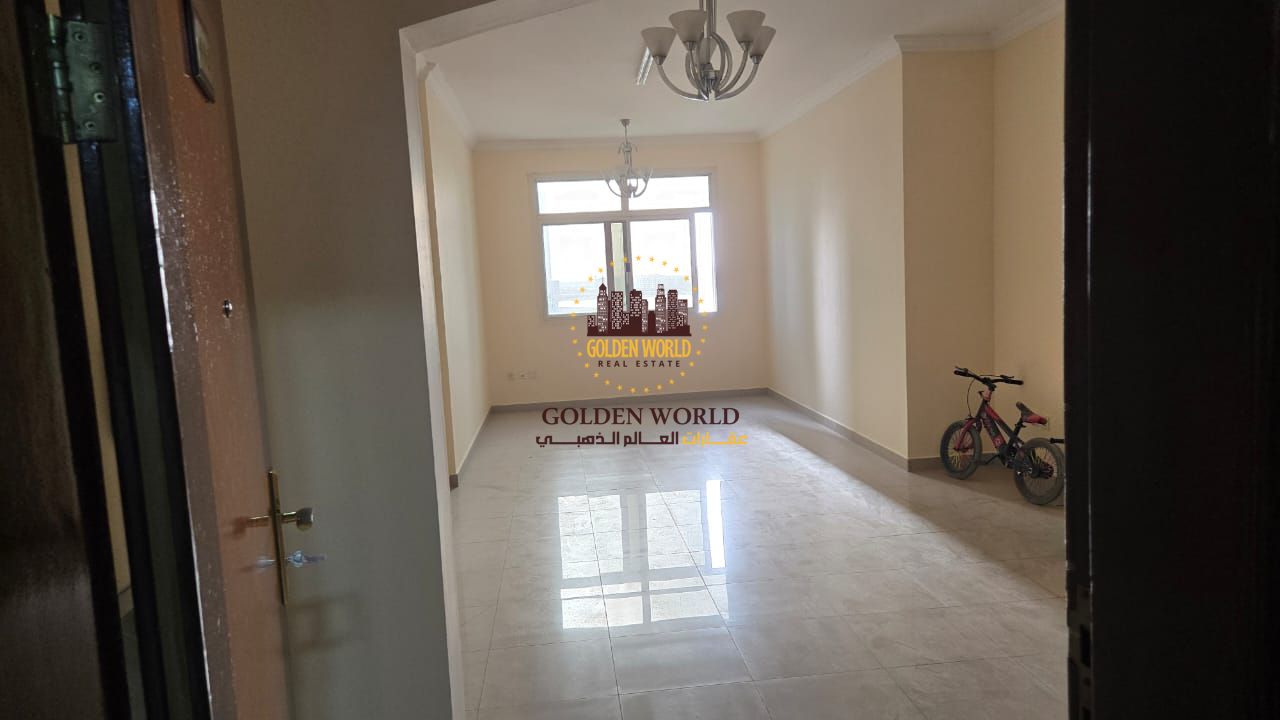 Two-bedroom apartment for rent in Al Khan, Sharjah. Central AC, 2 bathrooms, sea view, ground parking. Annual rent AED 44,000 with 4 or 6 cheques.