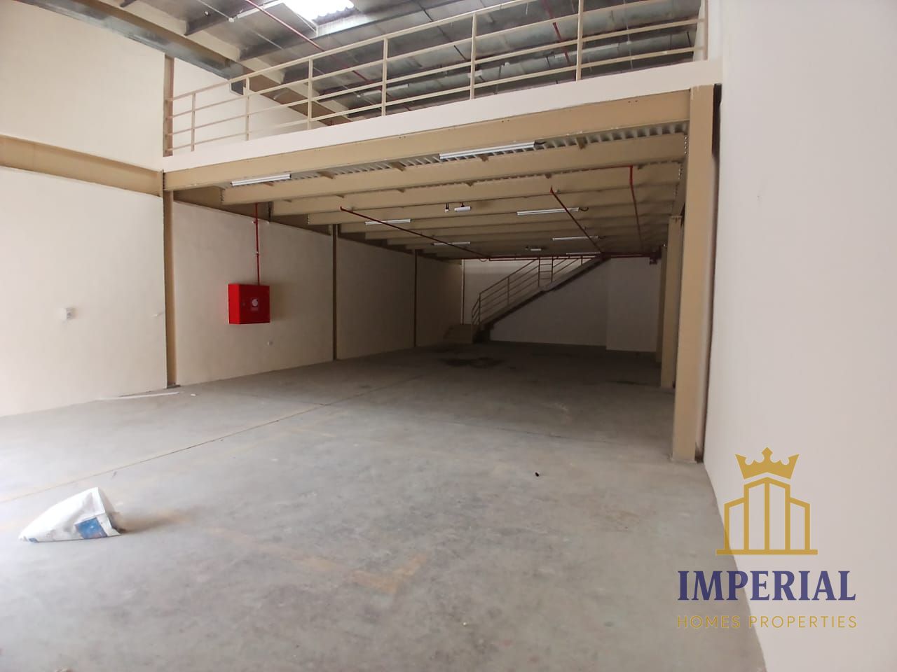 Warehouse for rent in Al Jurf Industrial Area with a mezzanine