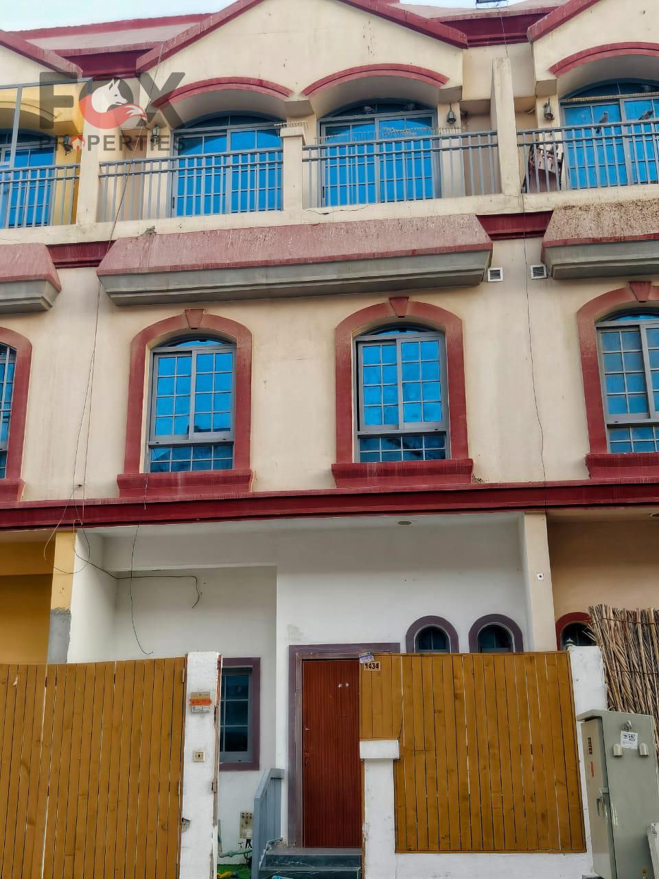 Uptown villa, two bedrooms and a living room, for sale in Al Zahia, with an area of 1600 sq ft, parking, and a yard. Freehold ownership for all nati